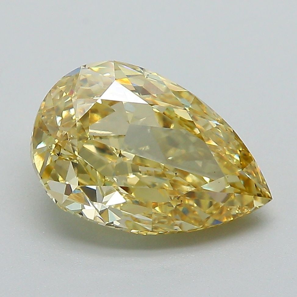 Loose Diamond - PEAR 3.09ct Fancy Vivid Yellow VS1: Loose Diamond - PEAR 3.09ct Fancy Vivid Yellow VS1 Source: This is a real non-mined Diamond that has been grown in a lab Shape: PEAR Carats: 3.09 Color: Fancy Vivid Yellow Certification: IGI Video: