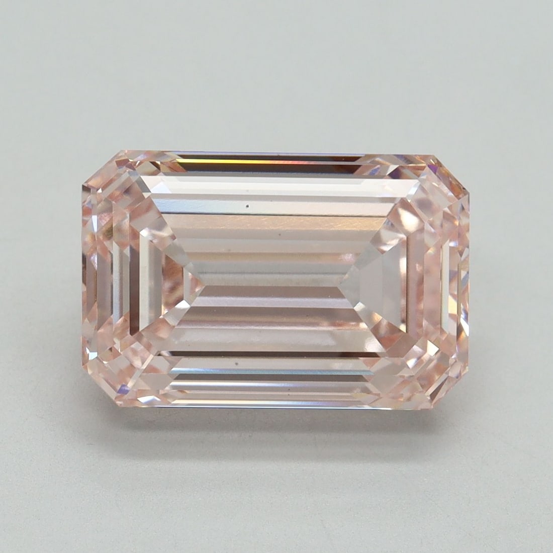 Loose Diamond - EMERALD 7.08ct Fancy Intense Pink VS2: Loose Diamond - EMERALD 7.08ct Fancy Intense Pink VS2 Source: This is a real non-mined Diamond that has been grown in a lab Shape: EMERALD Carats: 7.08 Color: Fancy Intense Pink Certification: IGI Vid
