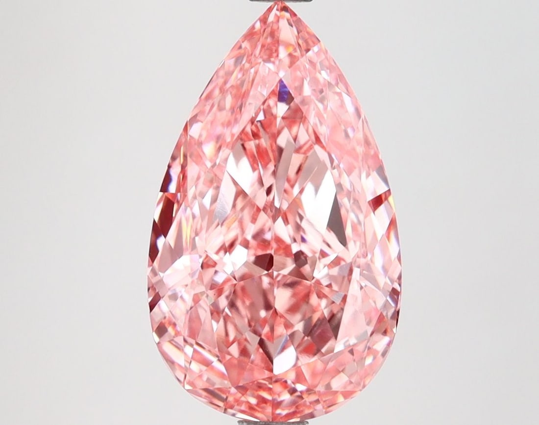 Loose Diamond - PEAR 3.67ct Fancy Vivid Pink VVS2: Loose Diamond - PEAR 3.67ct Fancy Vivid Pink VVS2 Source: This is a real non-mined Diamond that has been grown in a lab Shape: PEAR Carats: 3.67 Color: Fancy Vivid Pink Certification: IGI Video:
