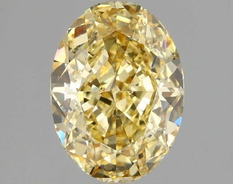 Loose Diamond - OVAL 2.1ct Fancy Vivid Yellow VS1: Loose Diamond - OVAL 2.1ct Fancy Vivid Yellow VS1 Source: This is a real non-mined Diamond that has been grown in a lab Shape: OVAL Carats: 2.1 Color: Fancy Vivid Yellow Certification: IGI Video: