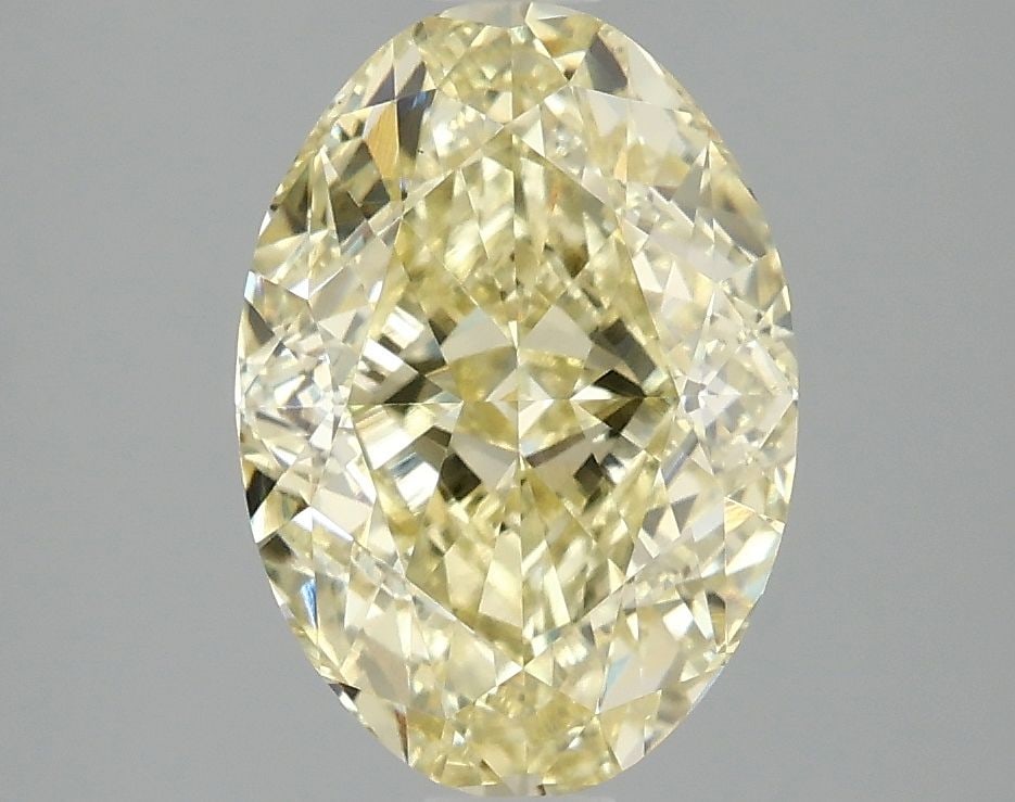 Loose Diamond - OVAL 3.06ct Fancy Intense Yellow VS2: Loose Diamond - OVAL 3.06ct Fancy Intense Yellow VS2 Source: This is a real non-mined Diamond that has been grown in a lab Shape: OVAL Carats: 3.06 Color: Fancy Intense Yellow Certification: IGI Video