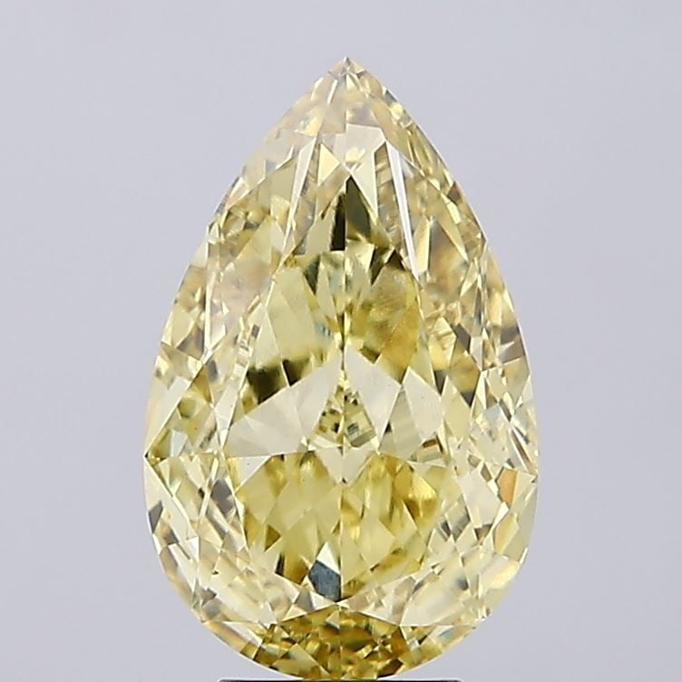 Loose Diamond - PEAR 6.18ct Fancy Vivid Yellow VS1: Loose Diamond - PEAR 6.18ct Fancy Vivid Yellow VS1 Source: This is a real non-mined Diamond that has been grown in a lab Shape: PEAR Carats: 6.18 Color: Fancy Vivid Yellow Certification: IGI Video: