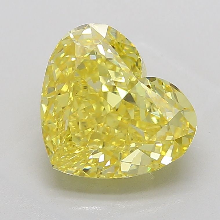 Loose Diamond - HEART 6.03ct Fancy Vivid Yellow VS1: Loose Diamond - HEART 6.03ct Fancy Vivid Yellow VS1 Source: This is a real non-mined Diamond that has been grown in a lab Shape: HEART Carats: 6.03 Color: Fancy Vivid Yellow Certification: IGI Video: