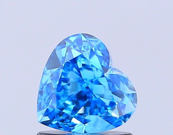 Loose Diamond - HEART 1.54ct Fancy Vivid Blue VVS2: Loose Diamond - HEART 1.54ct Fancy Vivid Blue VVS2 Source: This is a real non-mined Diamond that has been grown in a lab Shape: HEART Carats: 1.54 Color: Fancy Vivid Blue Certification: IGI Video: