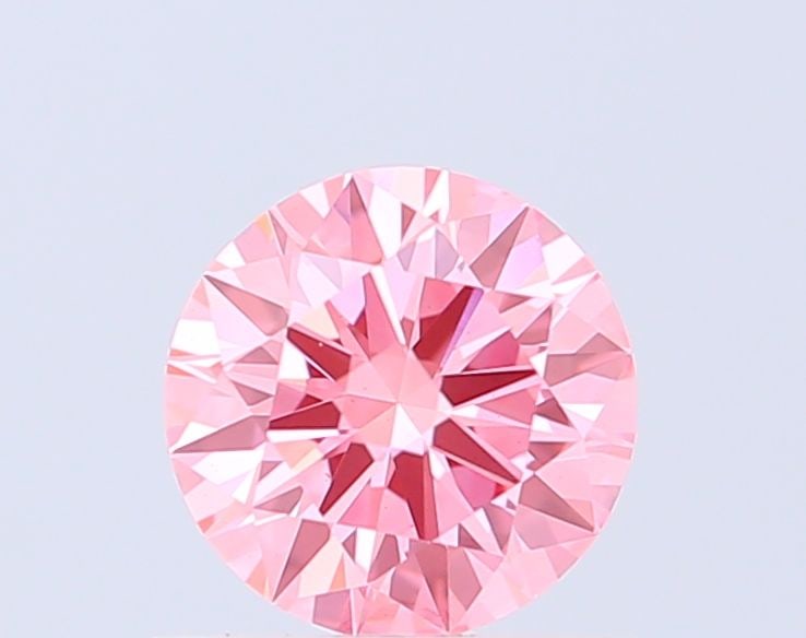 Ideal Loose Diamond - ROUND 0.74ct Fancy Vivid Pink VS1: Ideal Loose Diamond - ROUND 0.74ct Fancy Vivid Pink VS1 Source: This is a real non-mined Diamond that has been grown in a lab Shape: ROUND Carats: 0.74 Color: Fancy Vivid Pink Certification: IGI Video