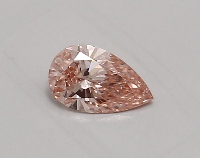 Loose Diamond - PEAR 0.44ct Fancy Vivid Pink VS2: Loose Diamond - PEAR 0.44ct Fancy Vivid Pink VS2 Source: This is a real non-mined Diamond that has been grown in a lab Shape: PEAR Carats: 0.44 Color: Fancy Vivid Pink Certification: IGI Video: