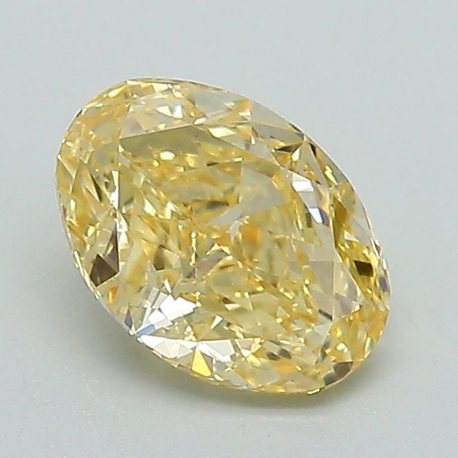Loose Diamond - OVAL 1.07ct Fancy Vivid Yellow VS1: Loose Diamond - OVAL 1.07ct Fancy Vivid Yellow VS1 Source: This is a real non-mined Diamond that has been grown in a lab Shape: OVAL Carats: 1.07 Color: Fancy Vivid Yellow Certification: IGI Video: