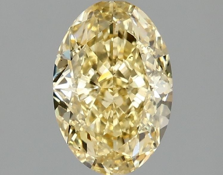 Loose Diamond - OVAL 1.59ct Fancy Intense Yellow VS2: Loose Diamond - OVAL 1.59ct Fancy Intense Yellow VS2 Source: This is a real non-mined Diamond that has been grown in a lab Shape: OVAL Carats: 1.59 Color: Fancy Intense Yellow Certification: IGI Video