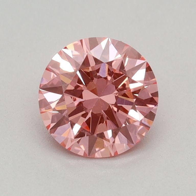 Loose Diamond - ROUND 0.47ct Fancy Vivid Pink VS1: Loose Diamond - ROUND 0.47ct Fancy Vivid Pink VS1 Source: This is a real non-mined Diamond that has been grown in a lab Shape: ROUND Carats: 0.47 Color: Fancy Vivid Pink Certification: IGI Video: