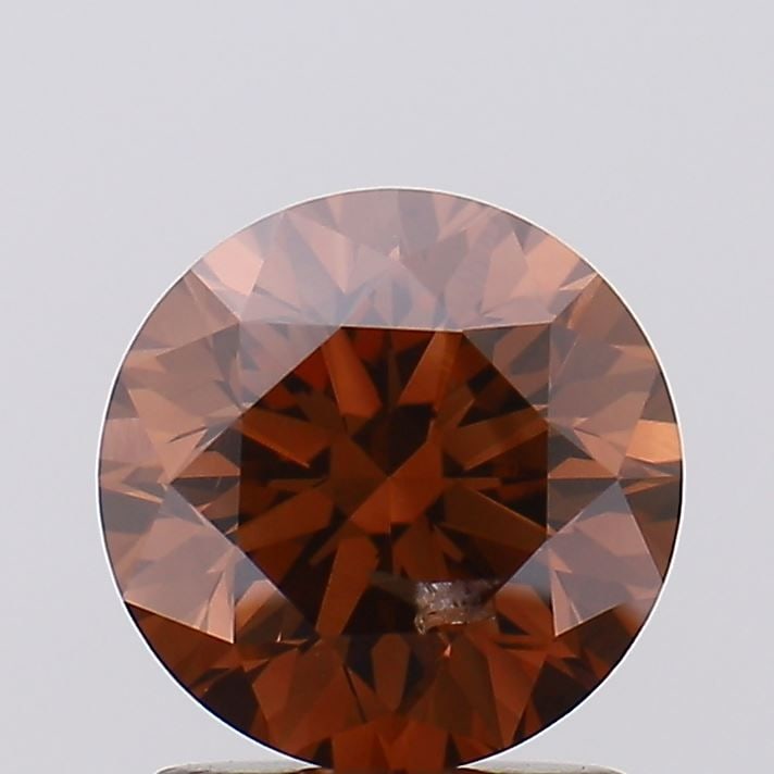 Loose Diamond - ROUND 1.63ct Fancy Brown SI2: Loose Diamond - ROUND 1.63ct Fancy Brown SI2 Source: This is a real non-mined Diamond that has been grown in a lab Shape: ROUND Carats: 1.63 Color: Fancy Brown Certification: IGI Video: