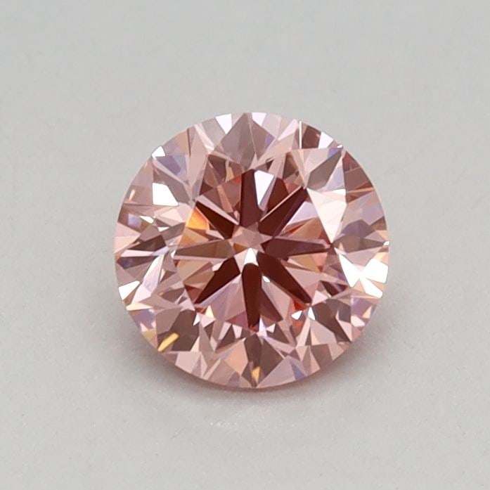 Loose Diamond - ROUND 0.4ct Fancy Vivid Pink VVS2: Loose Diamond - ROUND 0.4ct Fancy Vivid Pink VVS2 Source: This is a real non-mined Diamond that has been grown in a lab Shape: ROUND Carats: 0.4 Color: Fancy Vivid Pink Certification: IGI Video: