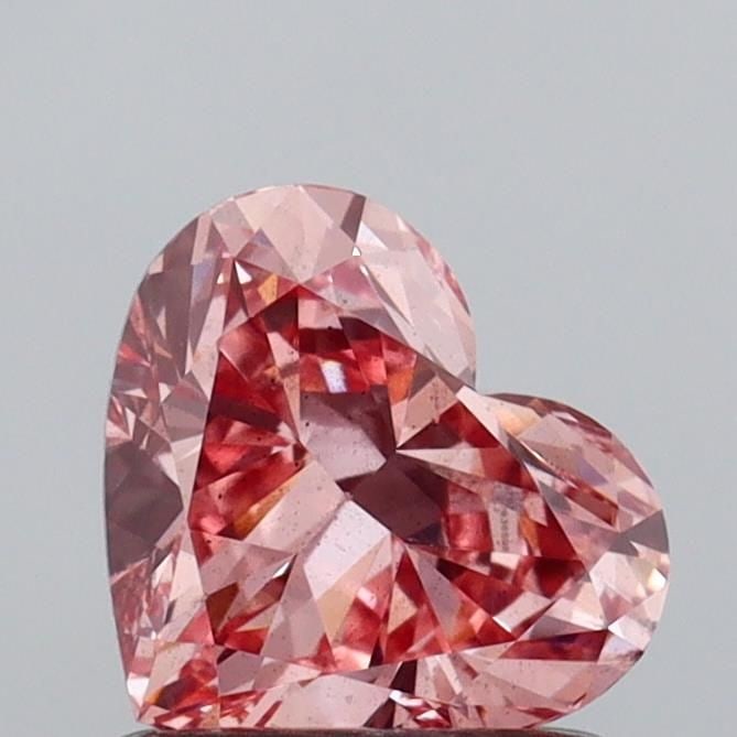 Loose Diamond - HEART 1.02ct Fancy Vivid Pink SI1: Loose Diamond - HEART 1.02ct Fancy Vivid Pink SI1 Source: This is a real non-mined Diamond that has been grown in a lab Shape: HEART Carats: 1.02 Color: Fancy Vivid Pink Certification: IGI Video: