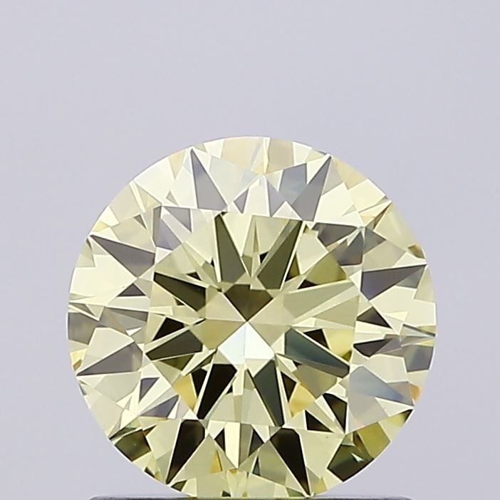 Loose Diamond - ROUND 1.02ct Fancy Yellow VVS2: Loose Diamond - ROUND 1.02ct Fancy Yellow VVS2 Source: This is a real non-mined Diamond that has been grown in a lab Shape: ROUND Carats: 1.02 Color: Fancy Yellow Certification: IGI Video: