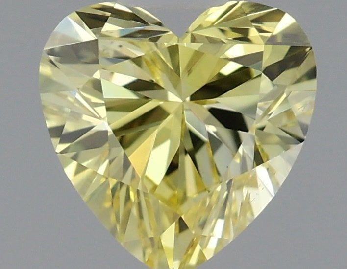 Loose Diamond - HEART 0.52ct Fancy Intense Yellow VS1: Loose Diamond - HEART 0.52ct Fancy Intense Yellow VS1 Source: This is a real non-mined Diamond that has been grown in a lab Shape: HEART Carats: 0.52 Color: Fancy Intense Yellow Certification: IGI Vid