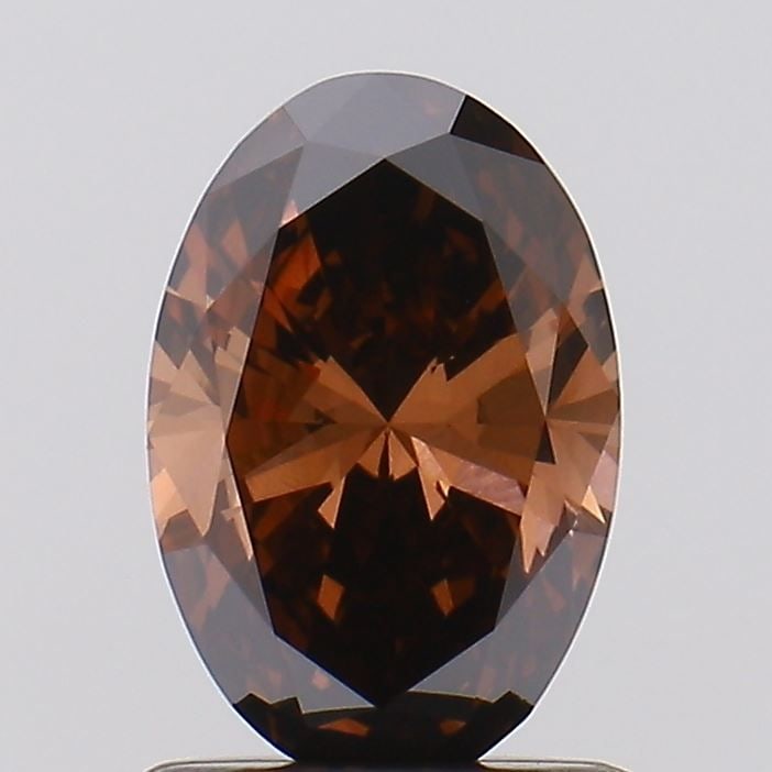 Loose Diamond - OVAL 0.87ct Fancy Deep Brown VS1: Loose Diamond - OVAL 0.87ct Fancy Deep Brown VS1 Source: This is a real non-mined Diamond that has been grown in a lab Shape: OVAL Carats: 0.87 Color: Fancy Deep Brown Certification: NONE Video:
