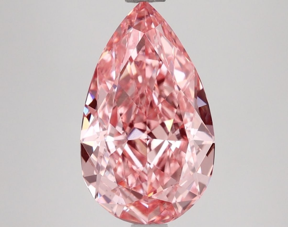 Loose Diamond - PEAR 3.14ct Fancy Vivid Pink VS1: Loose Diamond - PEAR 3.14ct Fancy Vivid Pink VS1 Source: This is a real non-mined Diamond that has been grown in a lab Shape: PEAR Carats: 3.14 Color: Fancy Vivid Pink Certification: IGI Video: