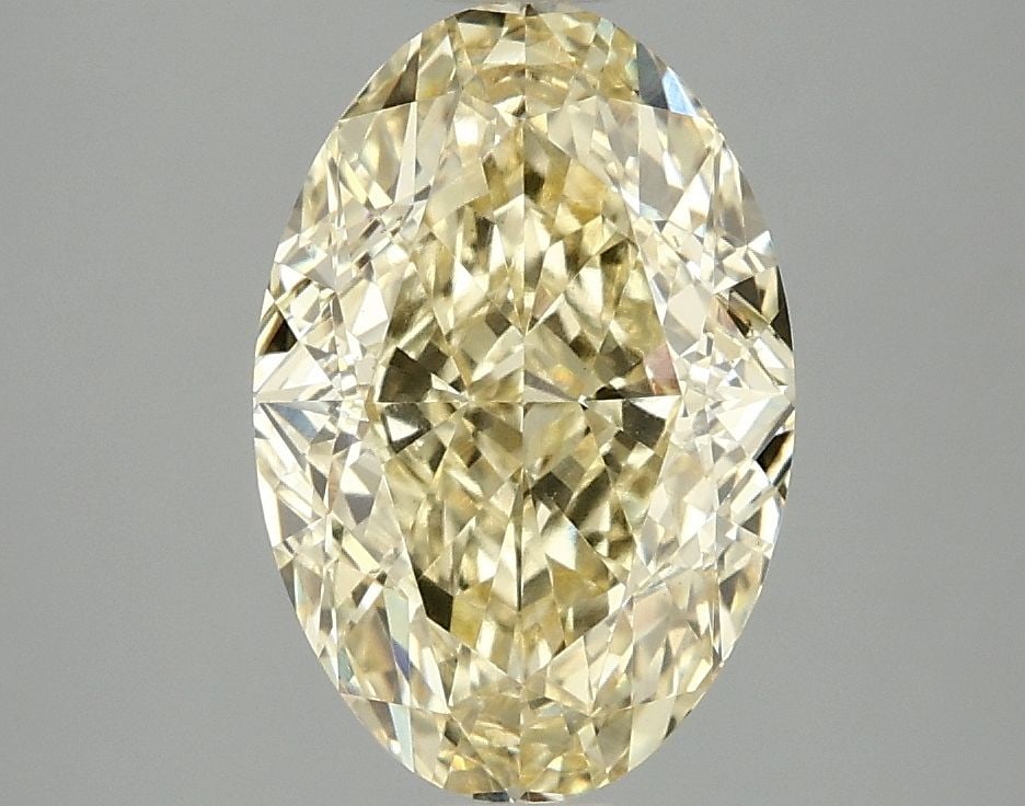Loose Diamond - OVAL 3.08ct Fancy Vivid Yellow VS1: Loose Diamond - OVAL 3.08ct Fancy Vivid Yellow VS1 Source: This is a real non-mined Diamond that has been grown in a lab Shape: OVAL Carats: 3.08 Color: Fancy Vivid Yellow Certification: IGI Video: