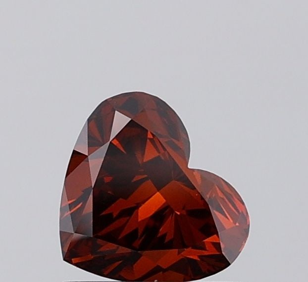 Loose Diamond - HEART 1.03ct Fancy Deep Orange VS2: Loose Diamond - HEART 1.03ct Fancy Deep Orange VS2 Source: This is a real non-mined Diamond that has been grown in a lab Shape: HEART Carats: 1.03 Color: Fancy Deep Orange Certification: IGI Video: