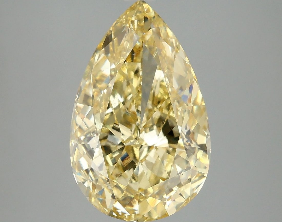 Loose Diamond - PEAR 5.0ct Fancy Vivid Yellow VS2: Loose Diamond - PEAR 5.0ct Fancy Vivid Yellow VS2 Source: This is a real non-mined Diamond that has been grown in a lab Shape: PEAR Carats: 5.0 Color: Fancy Vivid Yellow Certification: IGI Video: