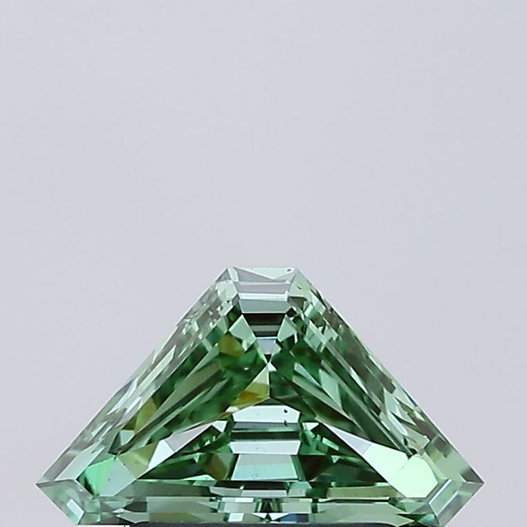Loose Diamond - TRIANGULAR 0.8ct Fancy Vivid Green VS2: Loose Diamond - TRIANGULAR 0.8ct Fancy Vivid Green VS2 Source: This is a real non-mined Diamond that has been grown in a lab Shape: TRIANGULAR Carats: 0.8 Color: Fancy Vivid Green Certification: NONE 