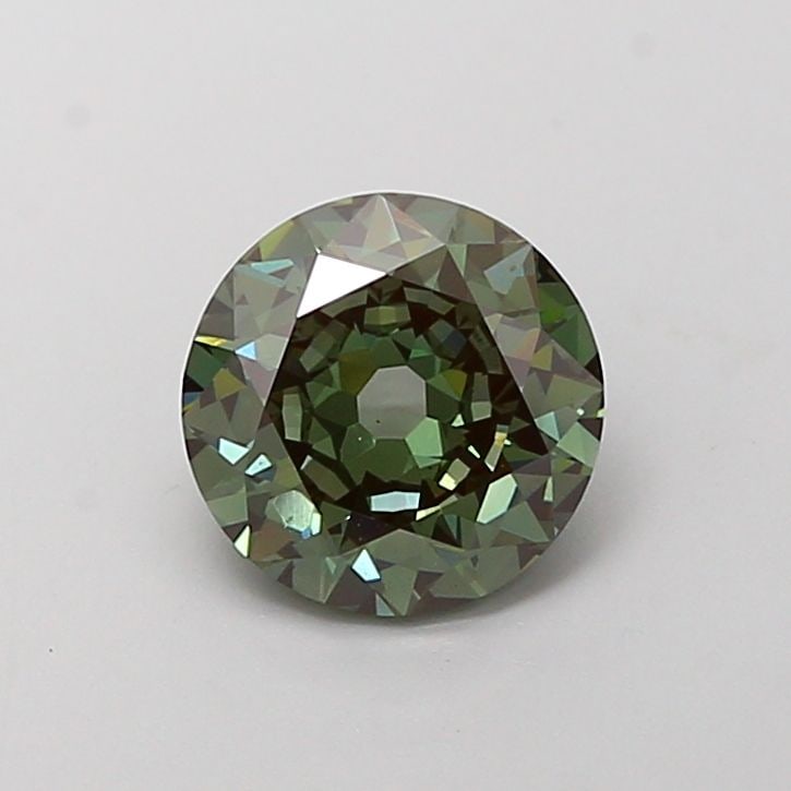 Loose Diamond - ROUND 1.81ct Fancy Deep Green VS1: Loose Diamond - ROUND 1.81ct Fancy Deep Green VS1 Source: This is a real non-mined Diamond that has been grown in a lab Shape: ROUND Carats: 1.81 Color: Fancy Deep Green Certification: IGI Video: