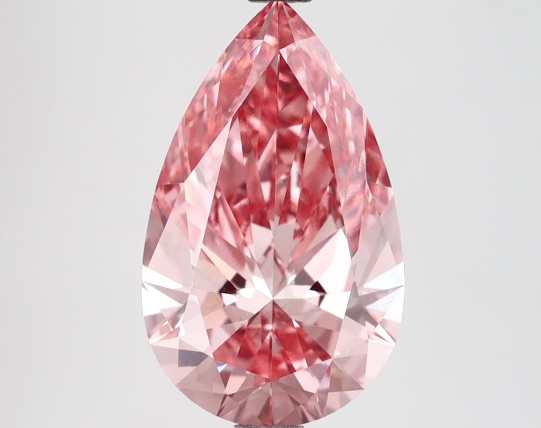 Loose Diamond - PEAR 3.34ct Fancy Vivid Pink VS2: Loose Diamond - PEAR 3.34ct Fancy Vivid Pink VS2 Source: This is a real non-mined Diamond that has been grown in a lab Shape: PEAR Carats: 3.34 Color: Fancy Vivid Pink Certification: IGI Video: