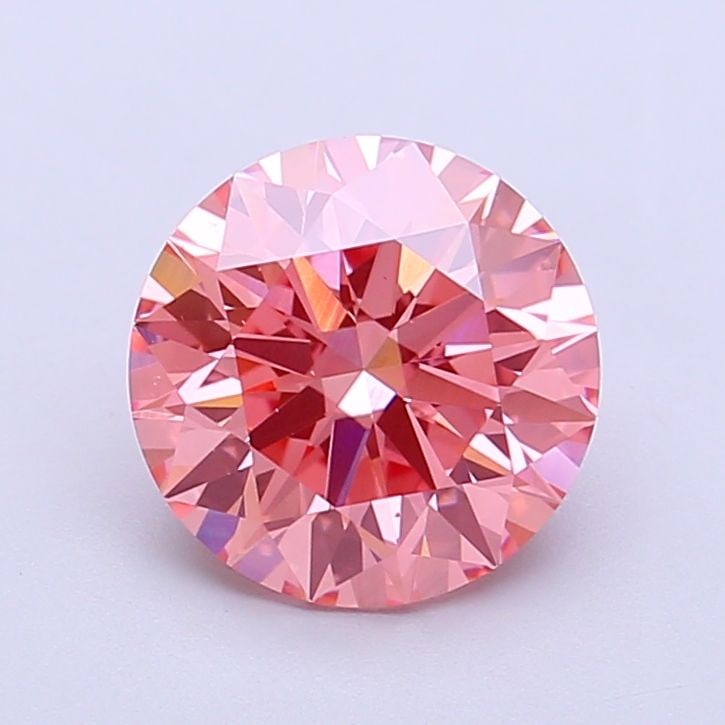 Ideal Loose Diamond - ROUND 2.06ct Fancy Vivid Pink VS2: Ideal Loose Diamond - ROUND 2.06ct Fancy Vivid Pink VS2 Source: This is a real non-mined Diamond that has been grown in a lab Shape: ROUND Carats: 2.06 Color: Fancy Vivid Pink Certification: IGI Video