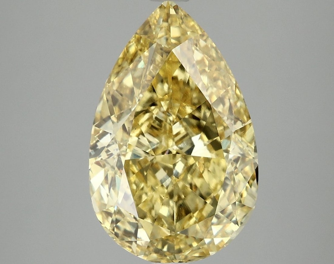 Loose Diamond - PEAR 5.1ct Fancy Vivid Yellow VS2: Loose Diamond - PEAR 5.1ct Fancy Vivid Yellow VS2 Source: This is a real non-mined Diamond that has been grown in a lab Shape: PEAR Carats: 5.1 Color: Fancy Vivid Yellow Certification: IGI Video: