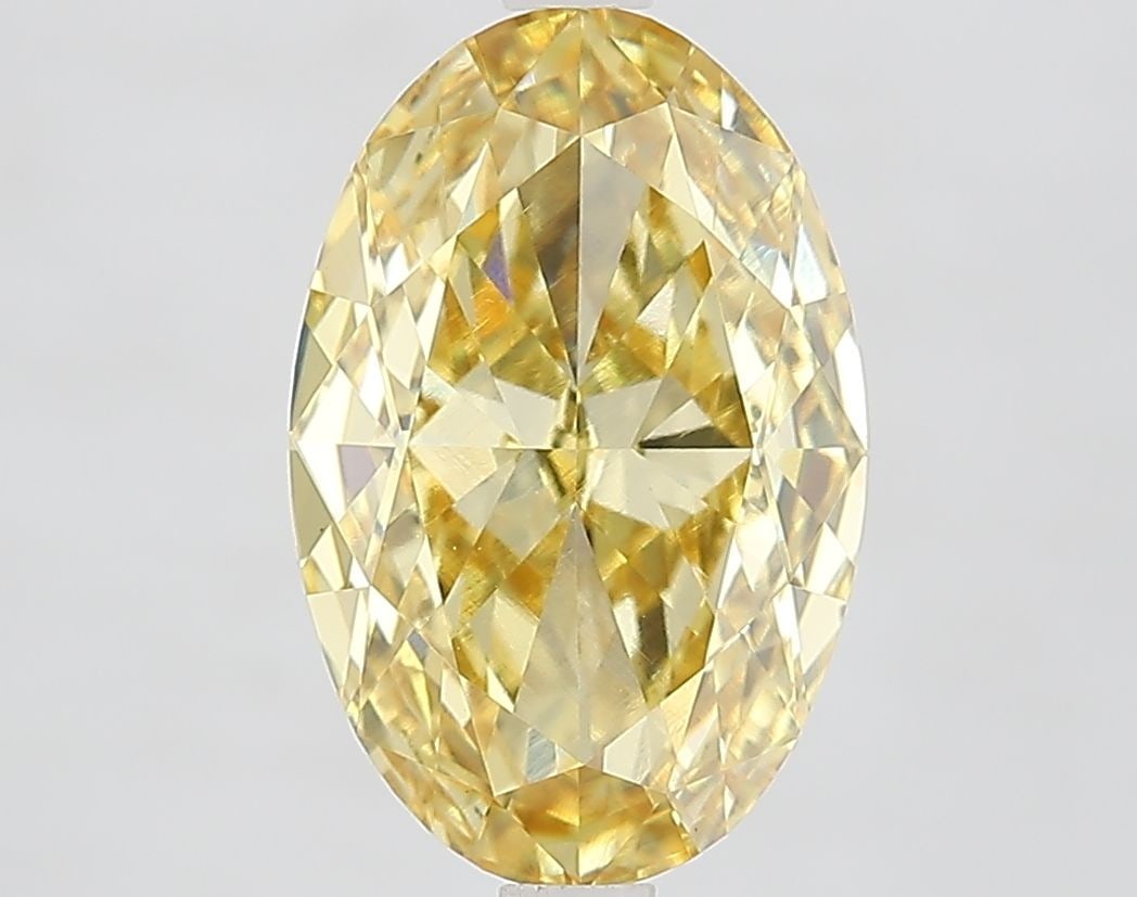 Loose Diamond - OVAL 3.9ct Fancy Vivid Yellow VVS2: Loose Diamond - OVAL 3.9ct Fancy Vivid Yellow VVS2 Source: This is a real non-mined Diamond that has been grown in a lab Shape: OVAL Carats: 3.9 Color: Fancy Vivid Yellow Certification: IGI Video: