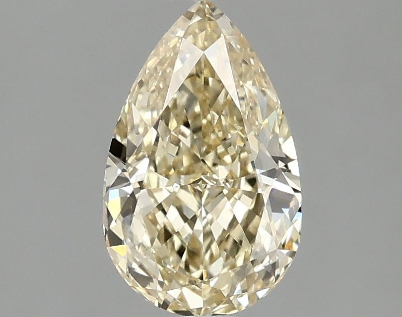 Loose Diamond - PEAR 1.51ct Fancy Vivid Yellow VVS2: Loose Diamond - PEAR 1.51ct Fancy Vivid Yellow VVS2 Source: This is a real non-mined Diamond that has been grown in a lab Shape: PEAR Carats: 1.51 Color: Fancy Vivid Yellow Certification: IGI Video: