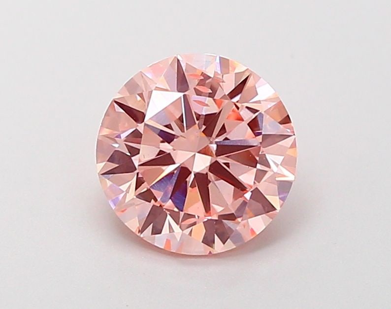 Loose Diamond - ROUND 1.51ct Fancy Vivid Pink SI2: Loose Diamond - ROUND 1.51ct Fancy Vivid Pink SI2 Source: This is a real non-mined Diamond that has been grown in a lab Shape: ROUND Carats: 1.51 Color: Fancy Vivid Pink Certification: IGI Video: