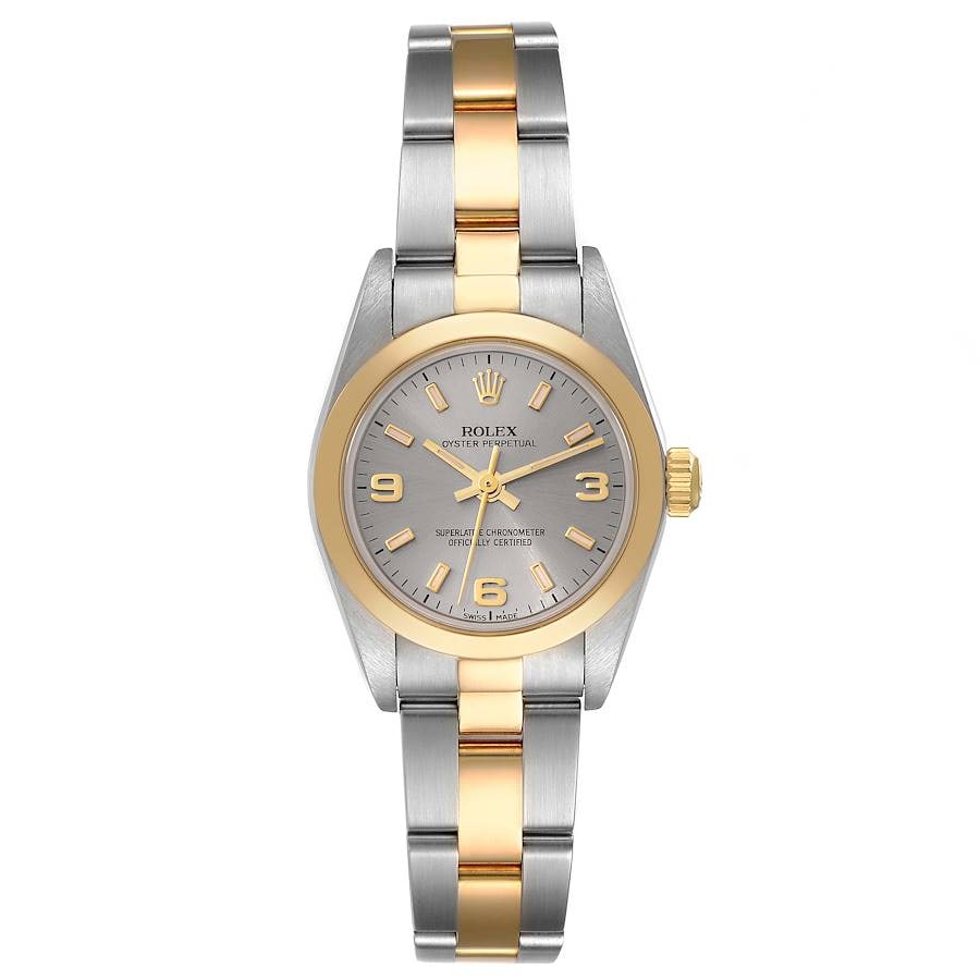 Ladies Rolex Oyster Perpetual Slate Dial Watch Ref 76183: Ladies Rolex Oyster Perpetual Slate Dial Watch Ref 76183 This Rolex Oyster Perpetual watch features a slate dial with gold markers, complemented by a smooth bezel and an Oyster-style bracelet.