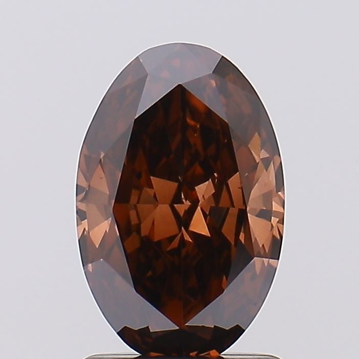 Loose Diamond - OVAL 1.29ct Fancy Deep Brown VS2: Loose Diamond - OVAL 1.29ct Fancy Deep Brown VS2 Source: This is a real non-mined Diamond that has been grown in a lab Shape: OVAL Carats: 1.29 Color: Fancy Deep Brown Certification: IGI Video: