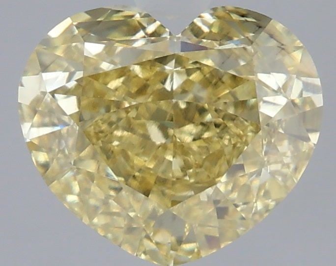 Loose Diamond - HEART 3.01ct Fancy Yellow VS2: Loose Diamond - HEART 3.01ct Fancy Yellow VS2 Source: This is a real non-mined Diamond that has been grown in a lab Shape: HEART Carats: 3.01 Color: Fancy Yellow Certification: IGI Video: