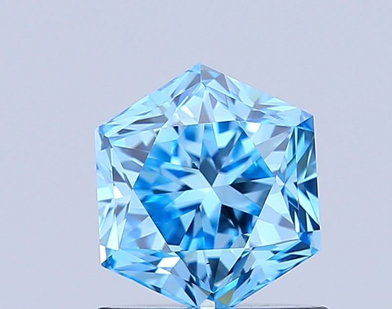 Loose Diamond - HEXAGONAL 1.04ct Fancy Vivid Blue VVS2: Loose Diamond - HEXAGONAL 1.04ct Fancy Vivid Blue VVS2 Source: This is a real non-mined Diamond that has been grown in a lab Shape: HEXAGONAL Carats: 1.04 Color: Fancy Vivid Blue Certification: IGI Vi