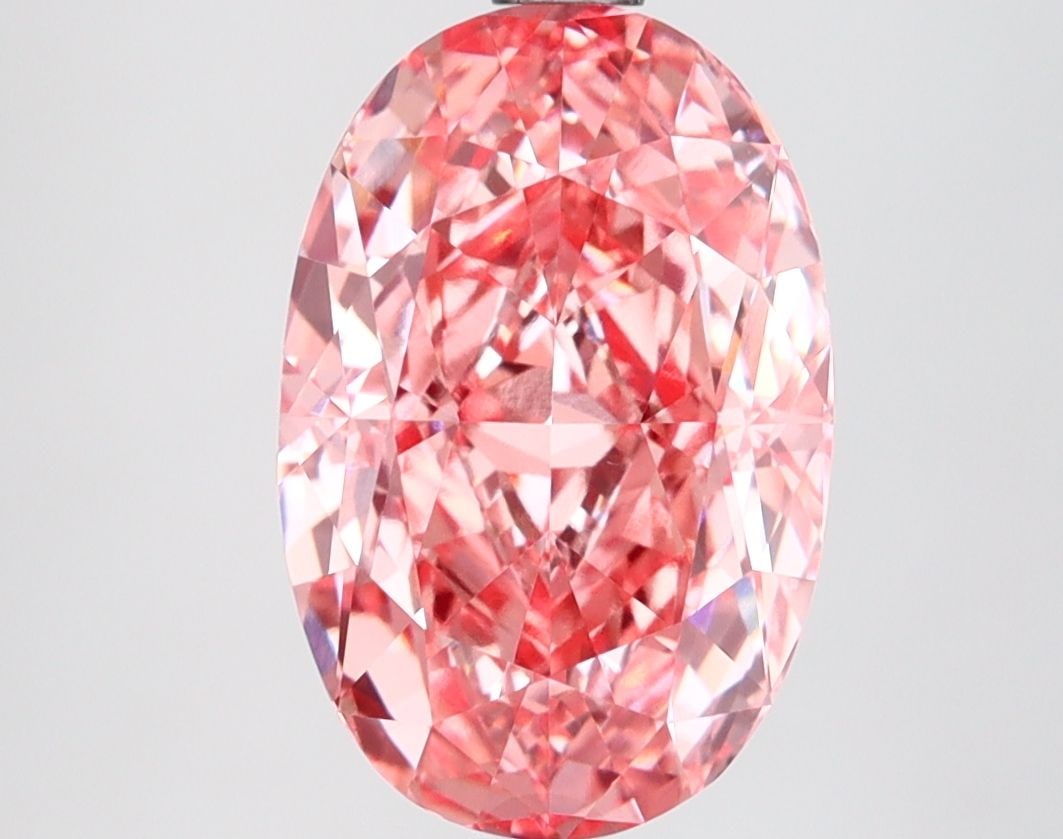 Loose Diamond - OVAL 3.67ct Fancy Vivid Pink VVS2: Loose Diamond - OVAL 3.67ct Fancy Vivid Pink VVS2 Source: This is a real non-mined Diamond that has been grown in a lab Shape: OVAL Carats: 3.67 Color: Fancy Vivid Pink Certification: IGI Video: