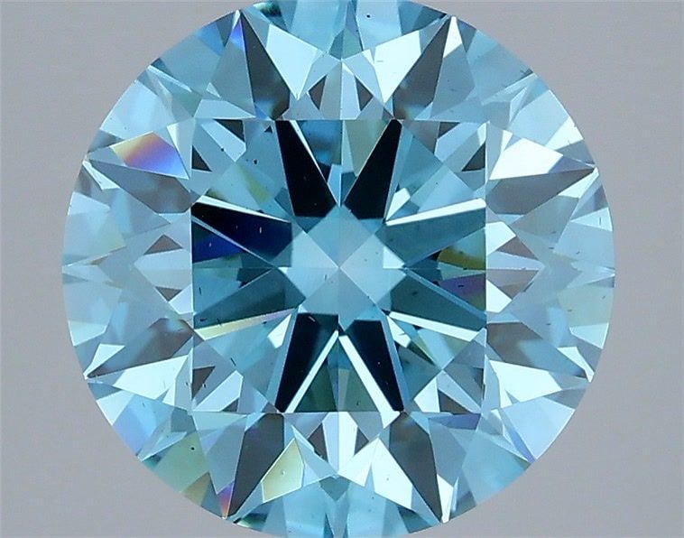 Ideal Loose Diamond - ROUND 4.05ct Fancy Vivid Blue VS2: Ideal Loose Diamond - ROUND 4.05ct Fancy Vivid Blue VS2 Source: This is a real non-mined Diamond that has been grown in a lab Shape: ROUND Carats: 4.05 Color: Fancy Vivid Blue Certification: IGI Video
