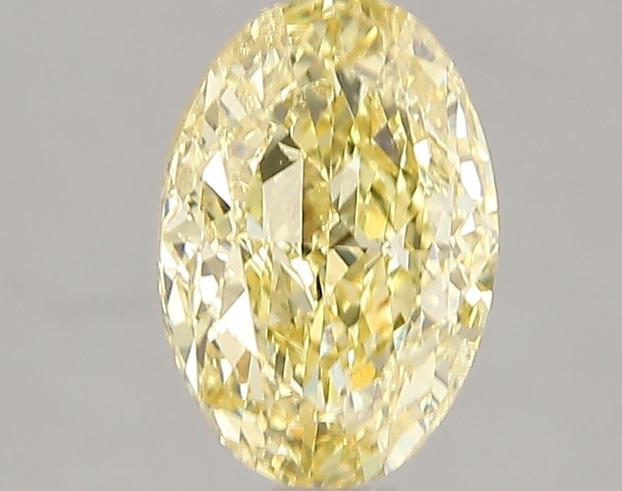 Loose Diamond - OVAL 2.0ct Fancy Vivid Yellow SI2: Loose Diamond - OVAL 2.0ct Fancy Vivid Yellow SI2 Source: This is a real non-mined Diamond that has been grown in a lab Shape: OVAL Carats: 2.0 Color: Fancy Vivid Yellow Certification: IGI Video: