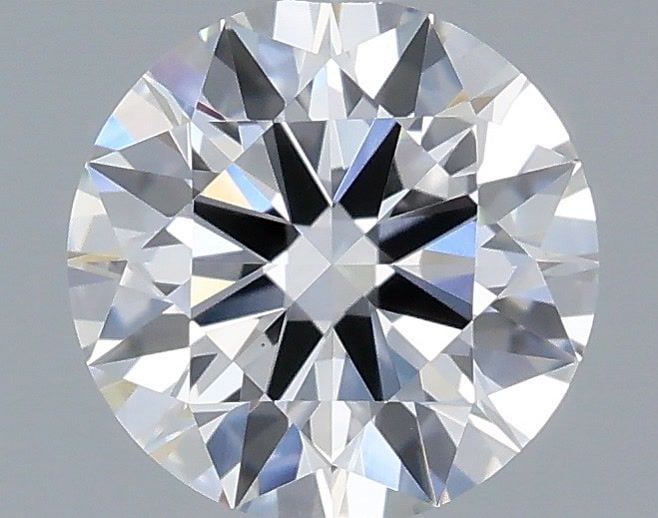 Ideal Loose Diamond - ROUND 0.69ct E VS1: Ideal Loose Diamond - ROUND 0.69ct E VS1 Source: This is a real non-mined Diamond that has been grown in a lab Shape: ROUND Carats: 0.69 Color: E Clarity: VS1 Certification: IGI Video: