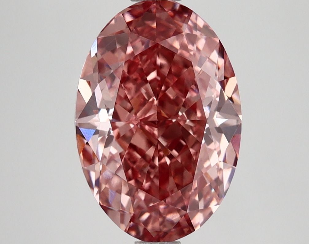 Loose Diamond - OVAL 3.19ct Fancy Vivid Pink VVS2: Loose Diamond - OVAL 3.19ct Fancy Vivid Pink VVS2 Source: This is a real non-mined Diamond that has been grown in a lab Shape: OVAL Carats: 3.19 Color: Fancy Vivid Pink Certification: IGI Video: