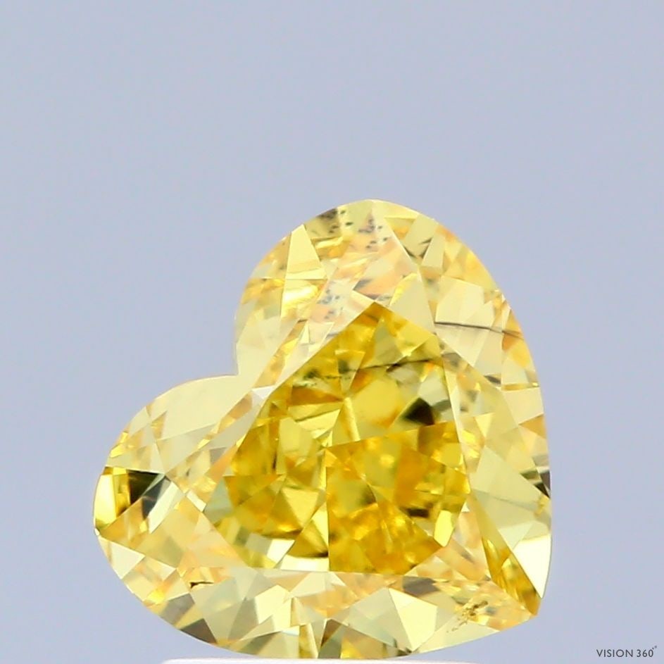 Loose Diamond - HEART 2.05ct Fancy Vivid Yellow VS2: Loose Diamond - HEART 2.05ct Fancy Vivid Yellow VS2 Source: This is a real non-mined Diamond that has been grown in a lab Shape: HEART Carats: 2.05 Color: Fancy Vivid Yellow Certification: IGI Video: