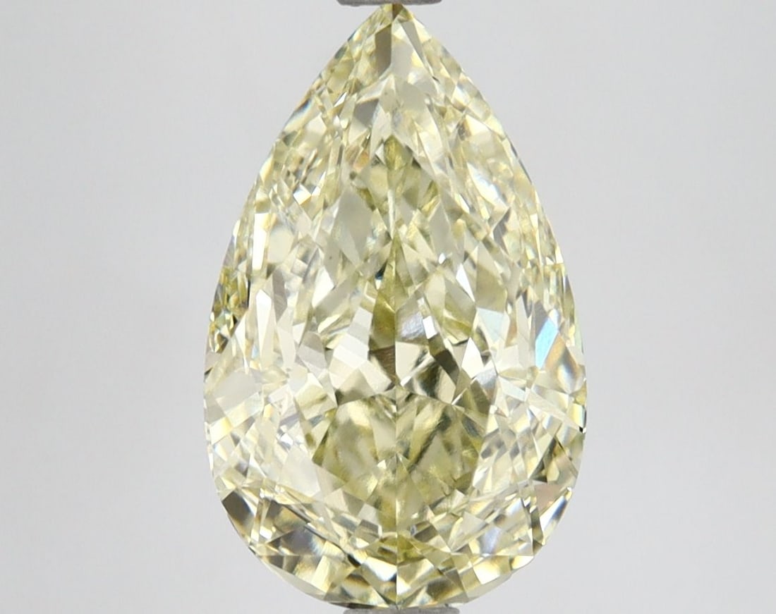 Loose Diamond - PEAR 3.36ct Fancy Yellow VVS2: Loose Diamond - PEAR 3.36ct Fancy Yellow VVS2 Source: This is a real non-mined Diamond that has been grown in a lab Shape: PEAR Carats: 3.36 Color: Fancy Yellow Certification: IGI Video: