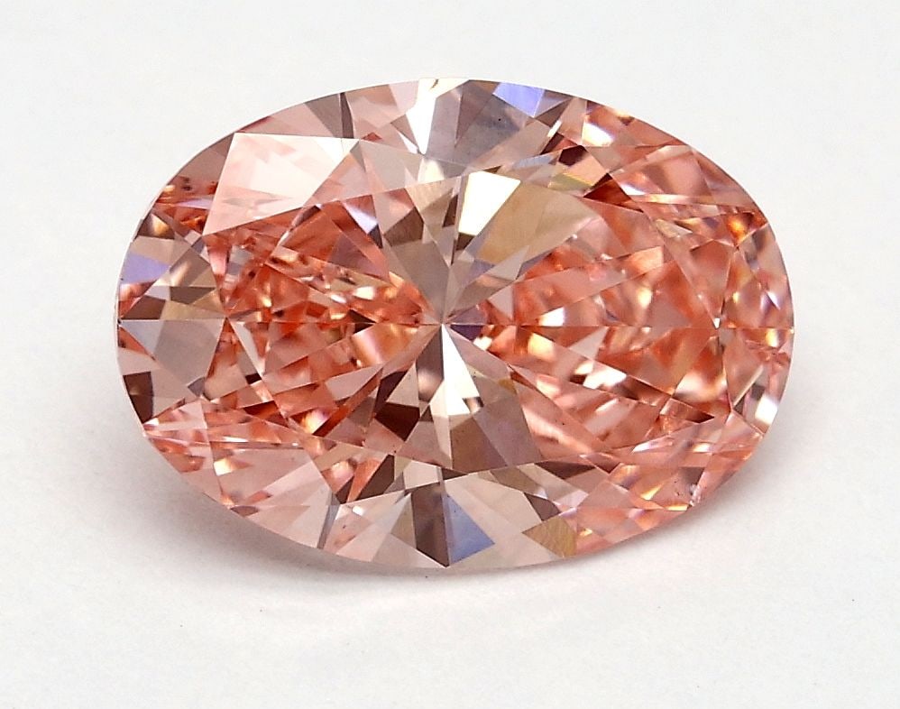 Loose Diamond - OVAL 1.54ct Fancy Vivid Pink VS2: Loose Diamond - OVAL 1.54ct Fancy Vivid Pink VS2 Source: This is a real non-mined Diamond that has been grown in a lab Shape: OVAL Carats: 1.54 Color: Fancy Vivid Pink Certification: IGI Video: