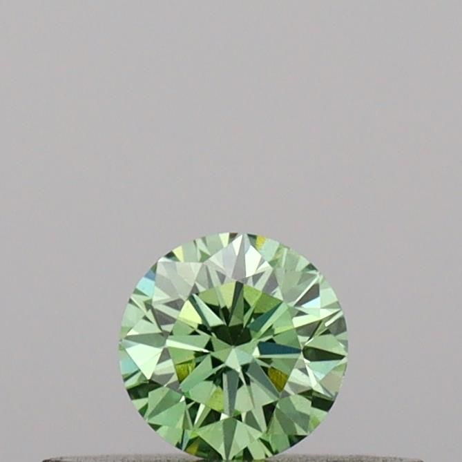 Loose Diamond - ROUND 0.18ct Fancy Vivid Green VS1: Loose Diamond - ROUND 0.18ct Fancy Vivid Green VS1 Source: This is a real non-mined Diamond that has been grown in a lab Shape: ROUND Carats: 0.18 Color: Fancy Vivid Green Certification: IGI Video: