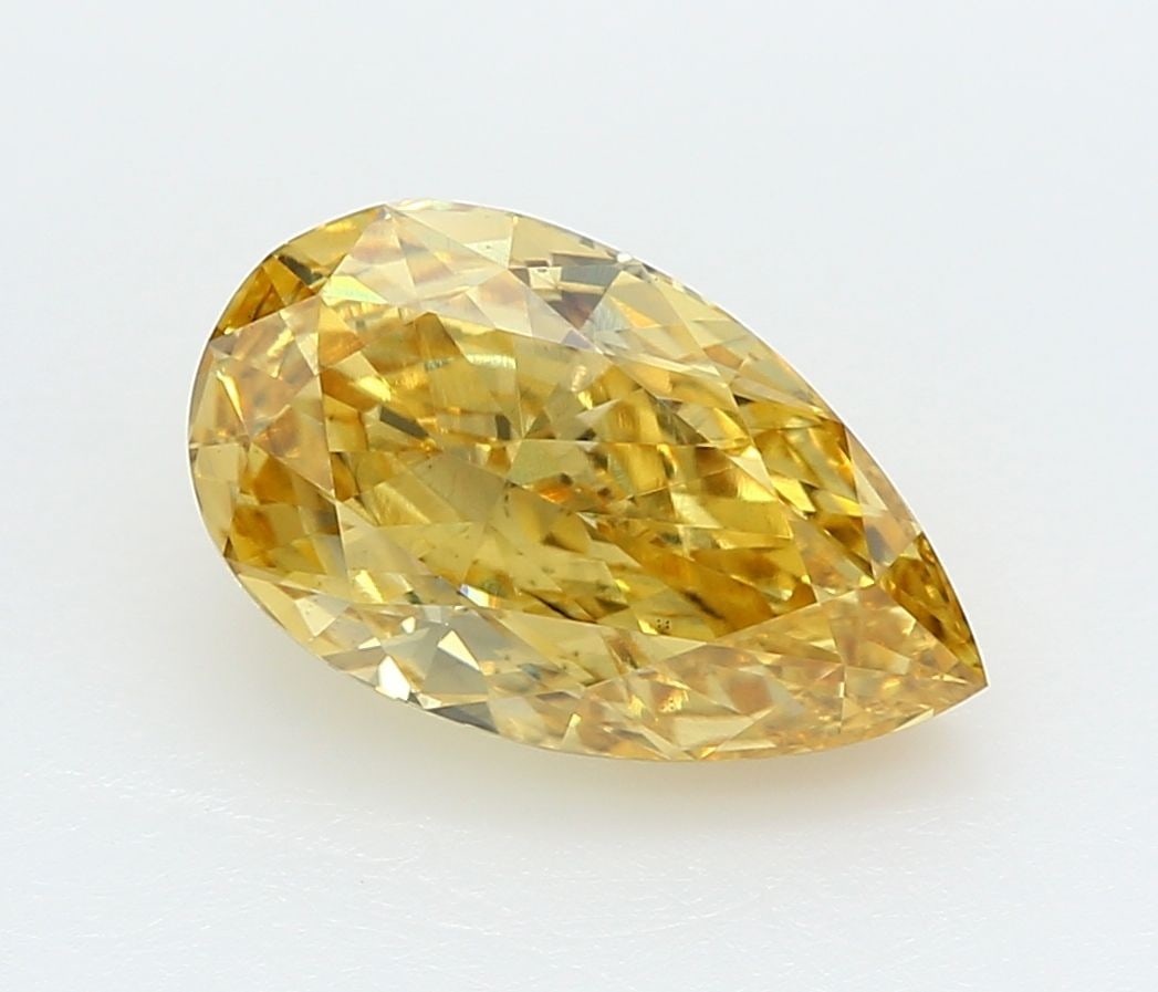 Loose Diamond - PEAR 2.06ct Fancy Vivid Yellow VS2: Loose Diamond - PEAR 2.06ct Fancy Vivid Yellow VS2 Source: This is a real non-mined Diamond that has been grown in a lab Shape: PEAR Carats: 2.06 Color: Fancy Vivid Yellow Certification: IGI Video: