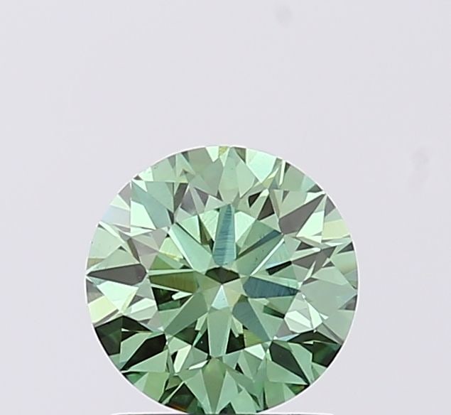 Loose Diamond - ROUND 1.11ct Fancy Vivid Green VS1: Loose Diamond - ROUND 1.11ct Fancy Vivid Green VS1 Source: This is a real non-mined Diamond that has been grown in a lab Shape: ROUND Carats: 1.11 Color: Fancy Vivid Green Certification: IGI Video: