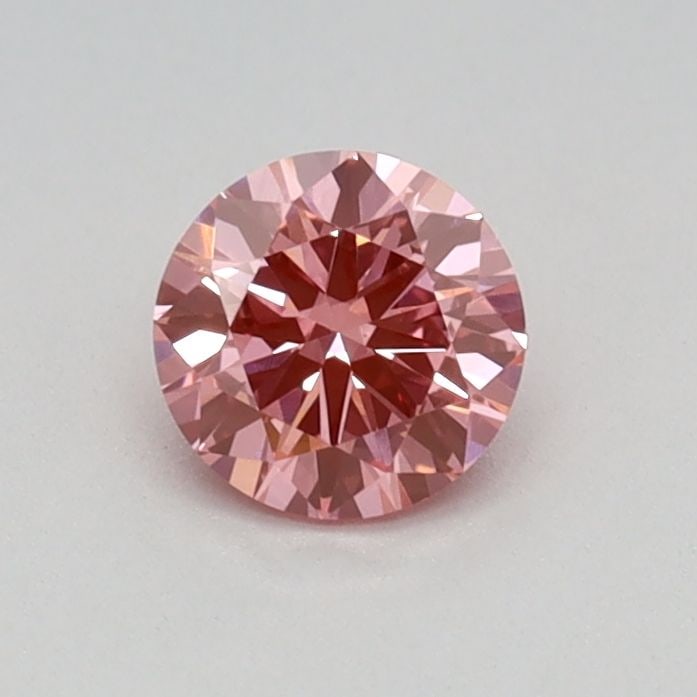 Loose Diamond - ROUND 0.32ct Fancy Vivid Pink VVS2: Loose Diamond - ROUND 0.32ct Fancy Vivid Pink VVS2 Source: This is a real non-mined Diamond that has been grown in a lab Shape: ROUND Carats: 0.32 Color: Fancy Vivid Pink Certification: IGI Video: