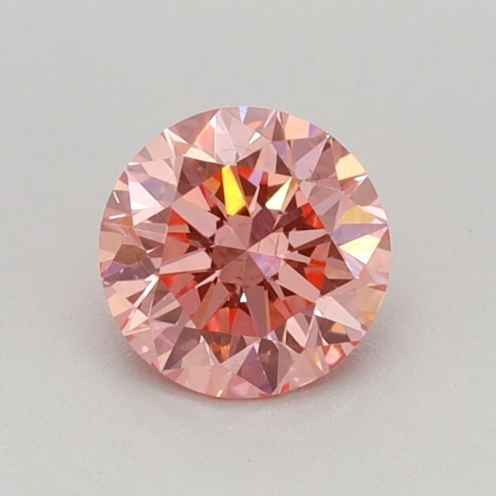 Loose Diamond - ROUND 0.46ct Fancy Vivid Pink VS2: Loose Diamond - ROUND 0.46ct Fancy Vivid Pink VS2 Source: This is a real non-mined Diamond that has been grown in a lab Shape: ROUND Carats: 0.46 Color: Fancy Vivid Pink Certification: IGI Video: