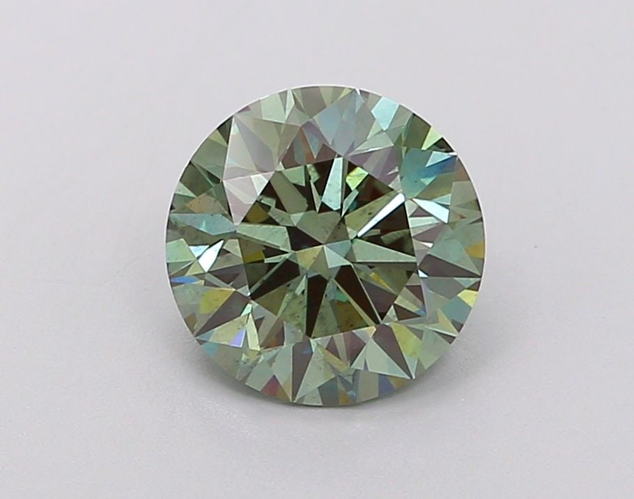 Ideal Loose Diamond - ROUND 1.66ct Fancy Vivid Green SI1: Ideal Loose Diamond - ROUND 1.66ct Fancy Vivid Green SI1 Source: This is a real non-mined Diamond that has been grown in a lab Shape: ROUND Carats: 1.66 Color: Fancy Vivid Green Certification: IGI Vid