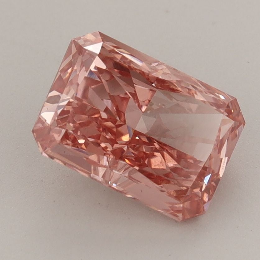 Loose Diamond - RADIANT 2.1ct Fancy Vivid Orangey Pink VS1: Loose Diamond - RADIANT 2.1ct Fancy Vivid Orangey Pink VS1 Source: This is a real non-mined Diamond that has been grown in a lab Shape: RADIANT Carats: 2.1 Color: Fancy Vivid Orangey Pink Certificatio